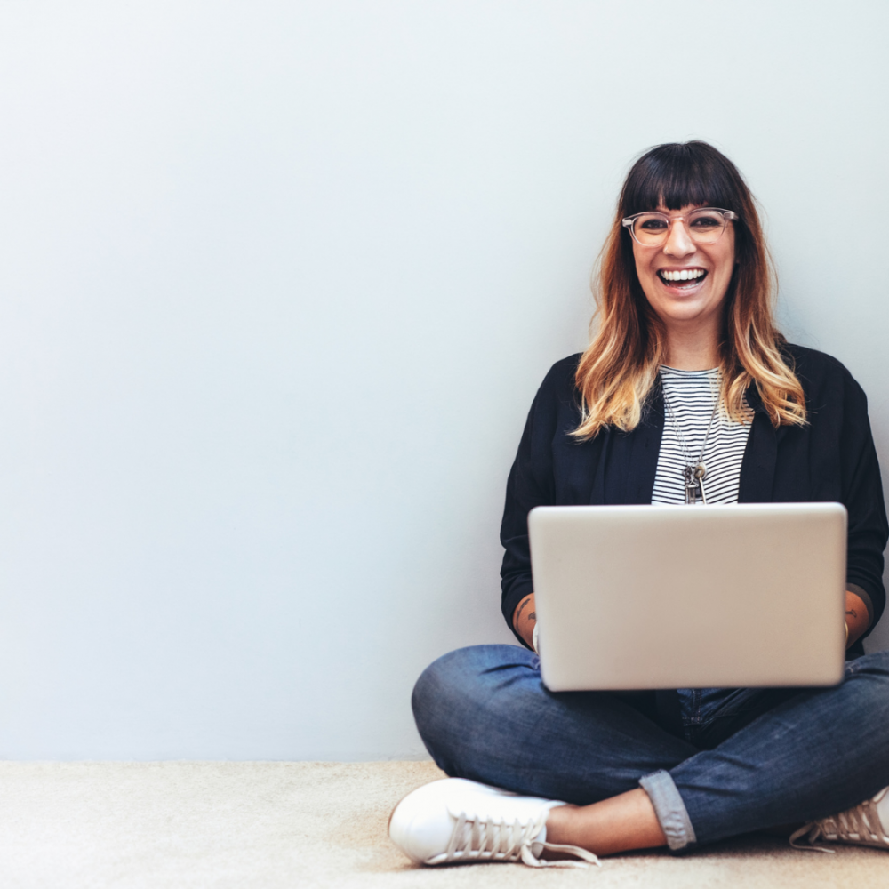 Dark haired woman sitting down